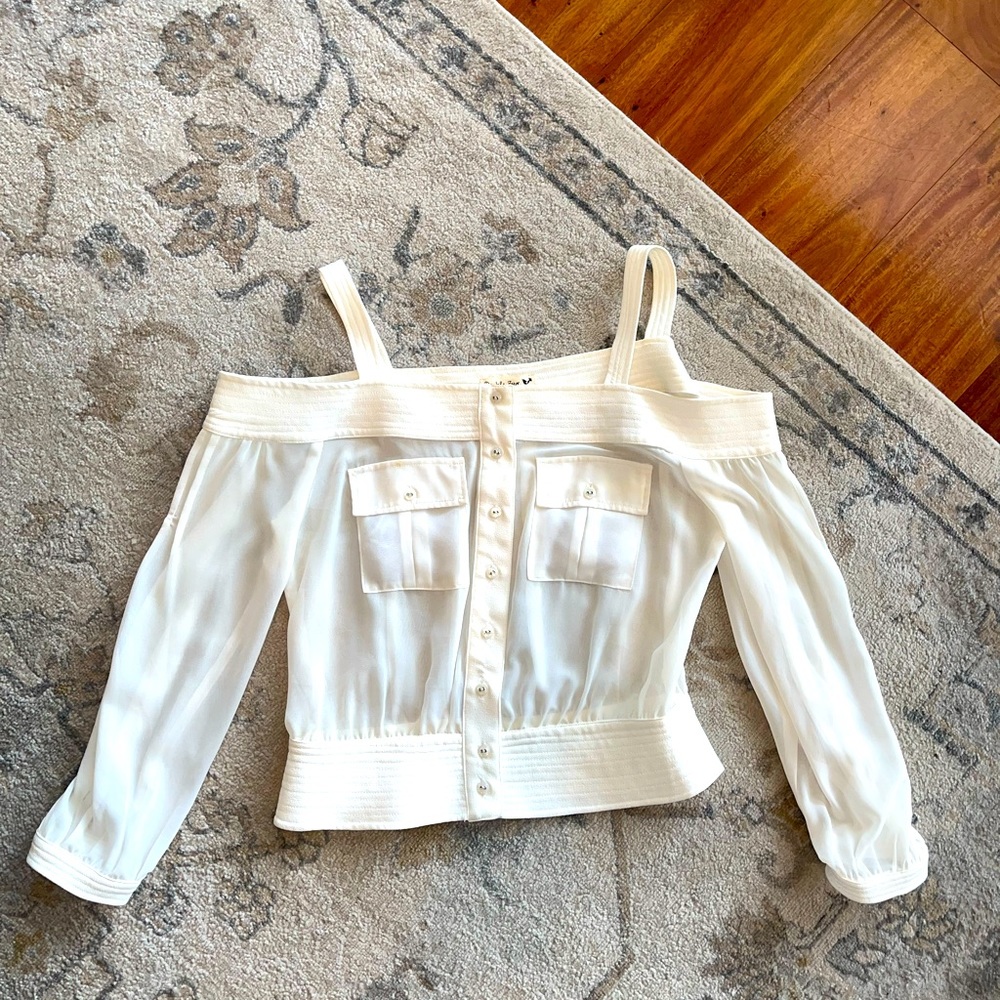 Super cute off-white of the shoulder top!